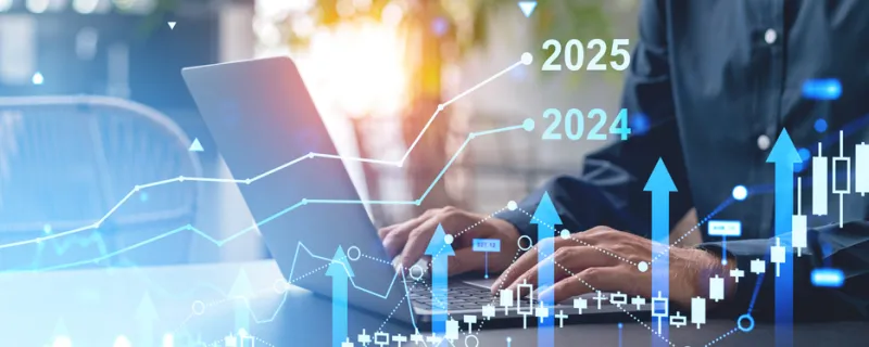 Hands typing on a laptop with overlay of financial graphs and charts, in a modern office setting, concept of business growth and future forecast Hands typing on a laptop with overlay of financial graphs and charts, in a modern office setting, concept of business growth and future forecast