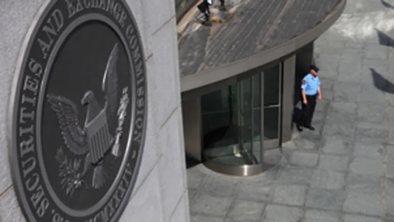 A security officer stands outside the U.S. Securities and Exchange Commission headquarters A security officer stands outside the U.S. Securities and Exchange Commission headquarters